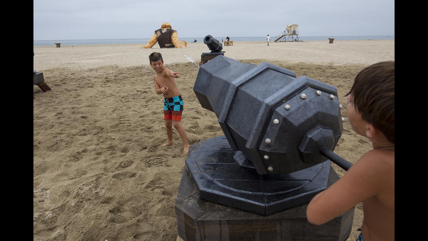Photo Gallery: 'Clash of Clans' beach sculpture
