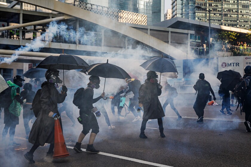Tear gas canisters fired by Hong Kong police against protesters