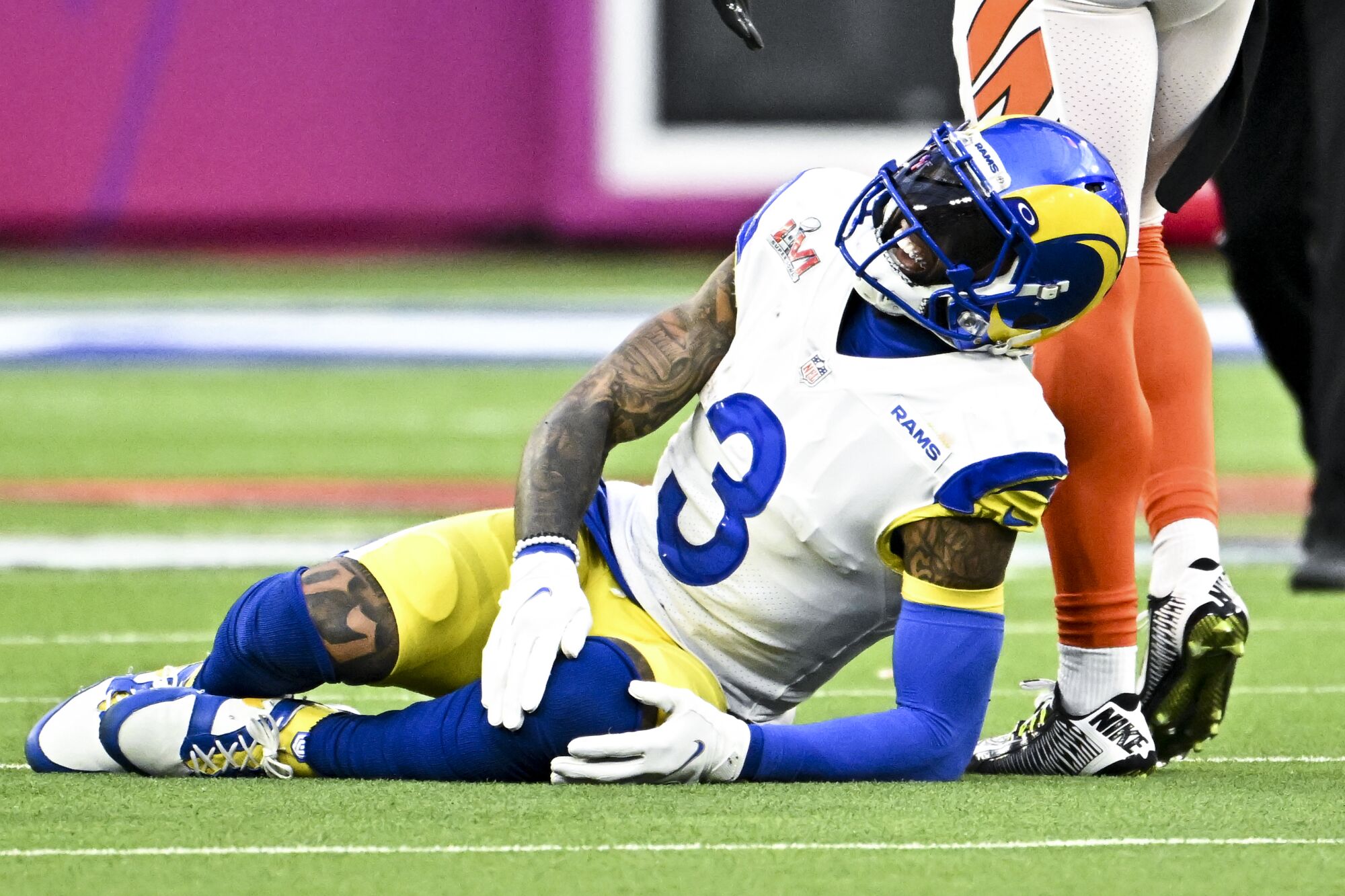 Rams wide receiver Odell Beckham Jr. grimaces after being injured.