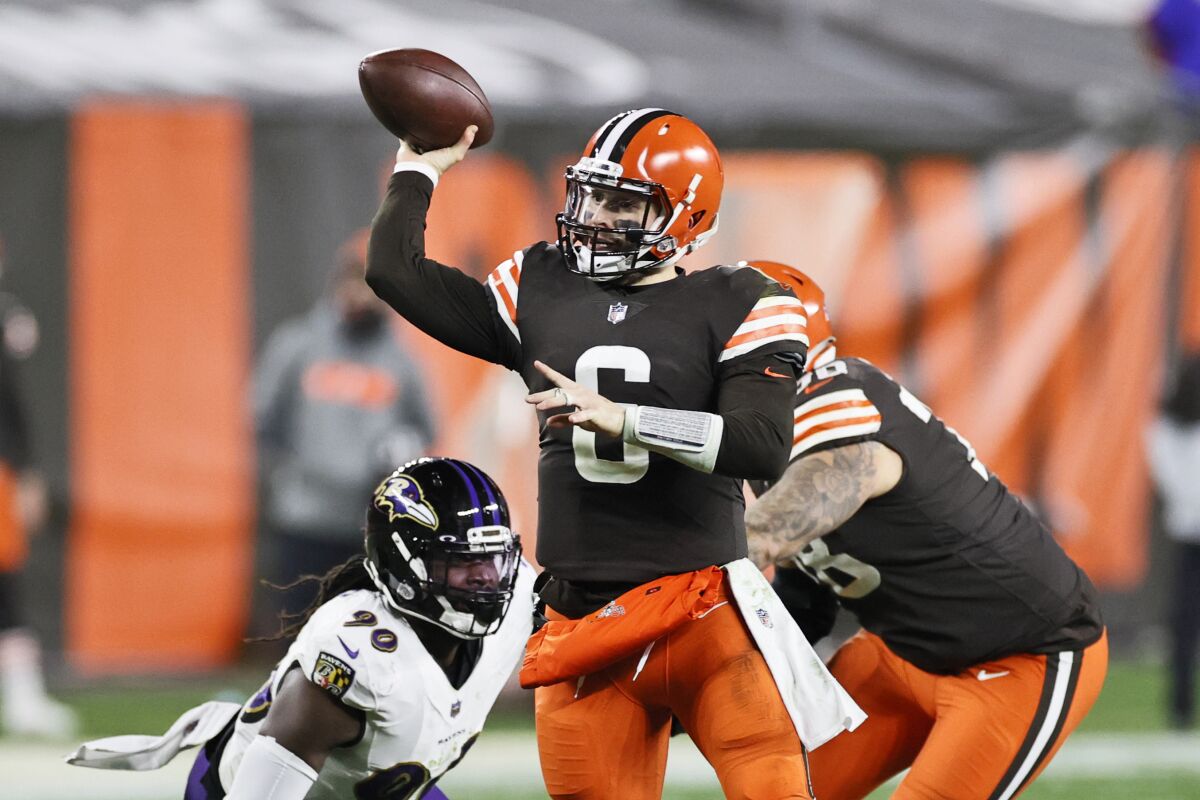 Cleveland Browns quarterback Baker Mayfield throws a touchdown pass against the Baltimore Ravens on Monday.
