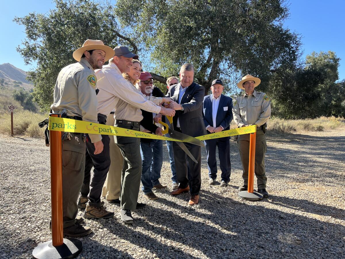 Officials cut the ribbon at the opening of Gypsum Canyon Wilderness.