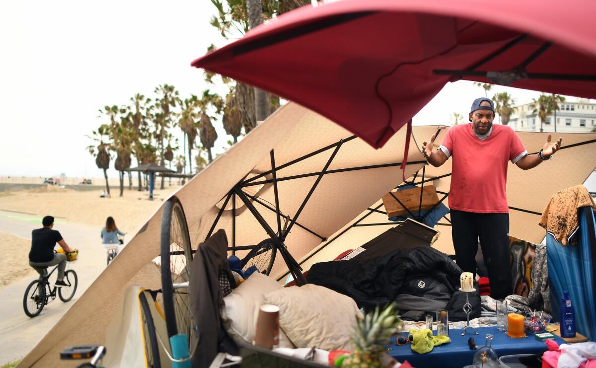 Derrick King, who has been homeless for 13 months, lives along the Strand in Venice Beach.