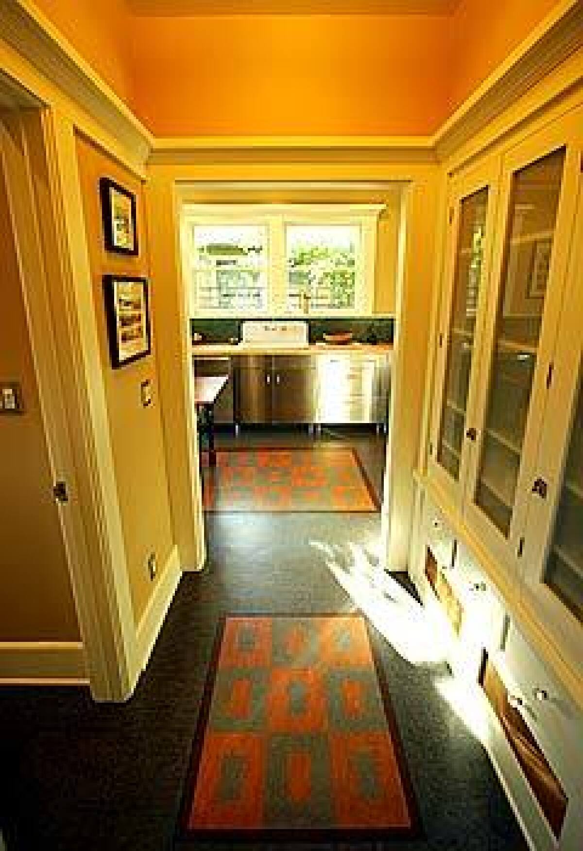 The hand-cut linoleum floor was devised by the kitchen designer and was based on a rug in the dining room.