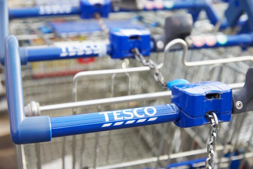 Oxfordshire, UK- November 24, 2014: Shopping Trolleys Outside Tesco Supermarket