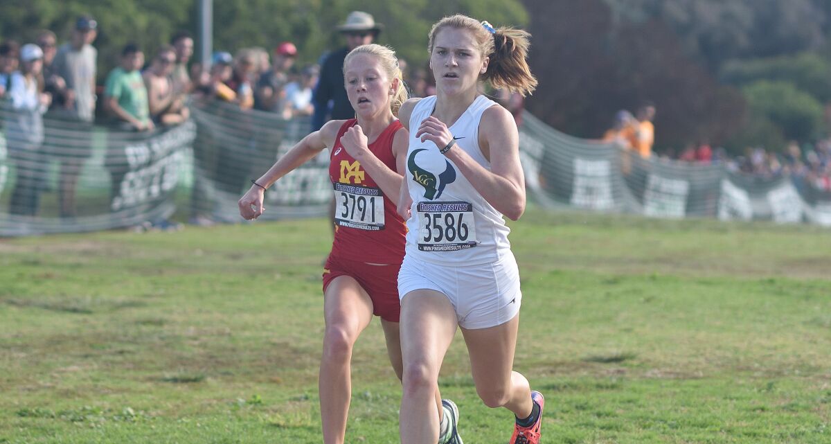 LCC junior Sydney Weaber powers through the final yards to win the CIF girls Division II title Saturday.