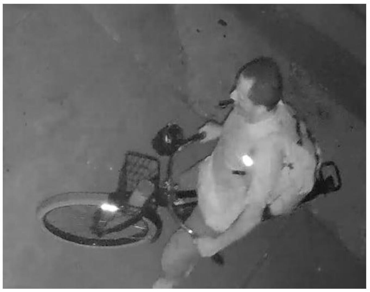 Surveillance image of man on a bicycle