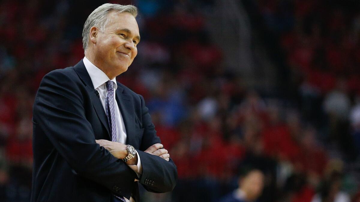 Rockets coach Mike D'Antoni plans to wear a mask while coaching in Orlando, Fla.