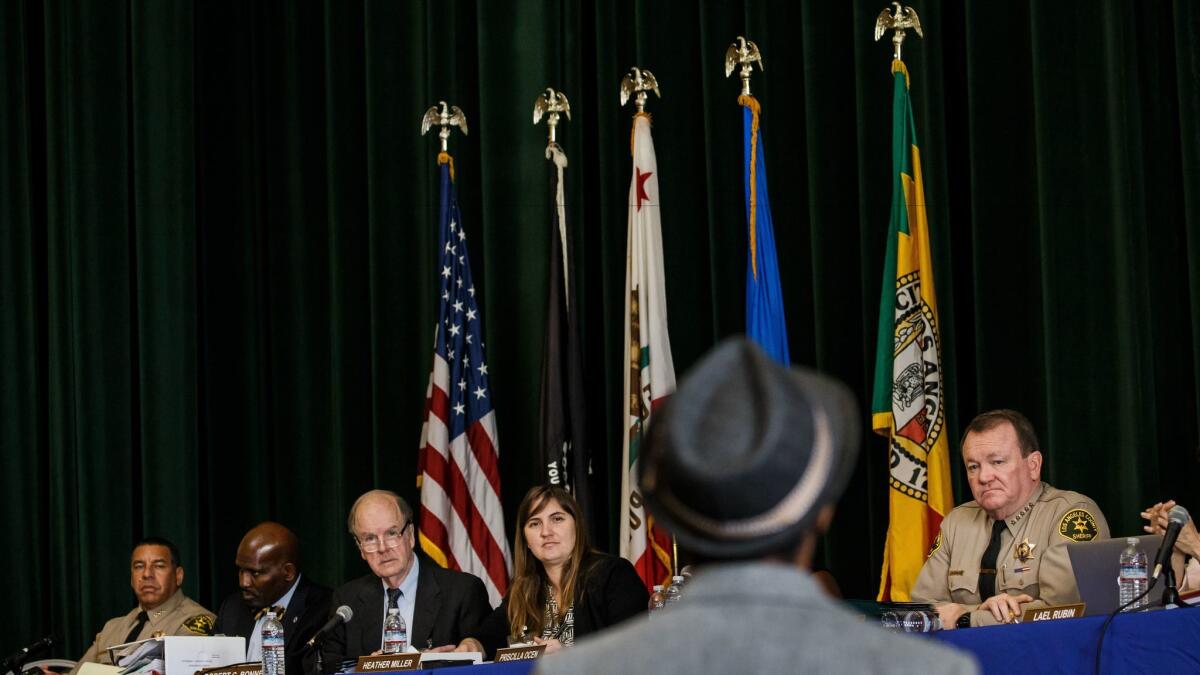 Los Angeles County Sheriff Jim McDonnell and members of the new Sheriff Civilian Oversight Commission listen to statements made by the public at the panel's first monthly meeting.