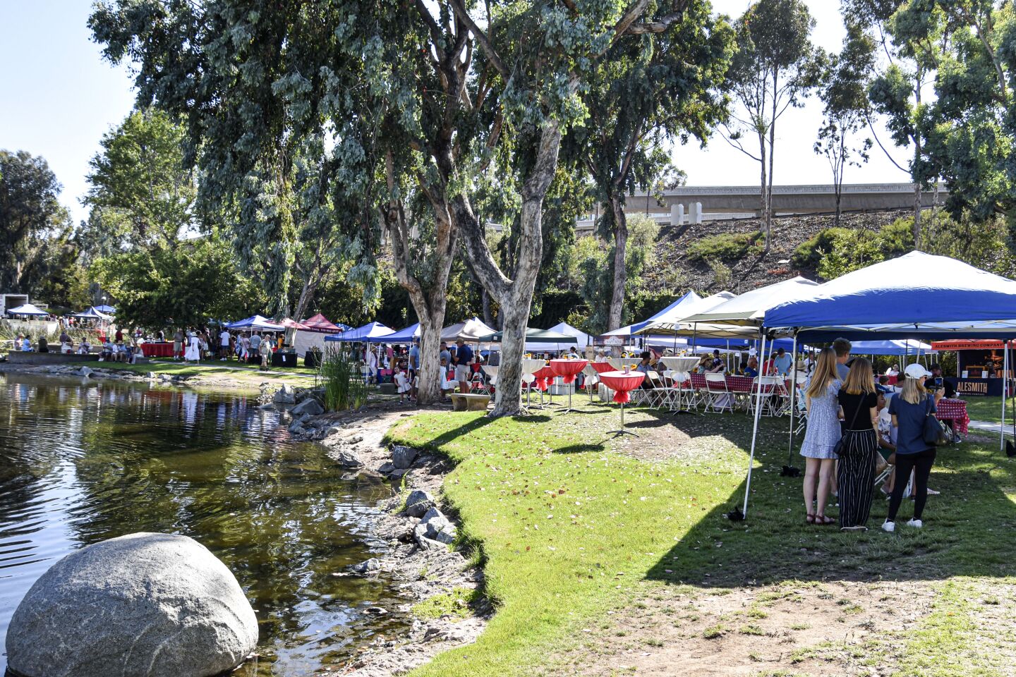 The Vines and Vittles booths lined the path that circled the picturesque Webb Lake in Rancho Bernardo.