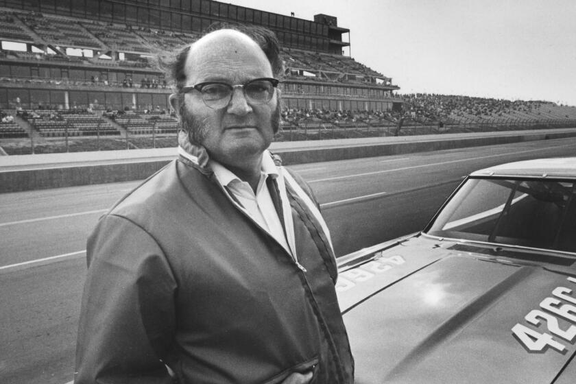 Los Angeles Times motor sports writer Shav Glick in a 1971 photo at an unknown track.