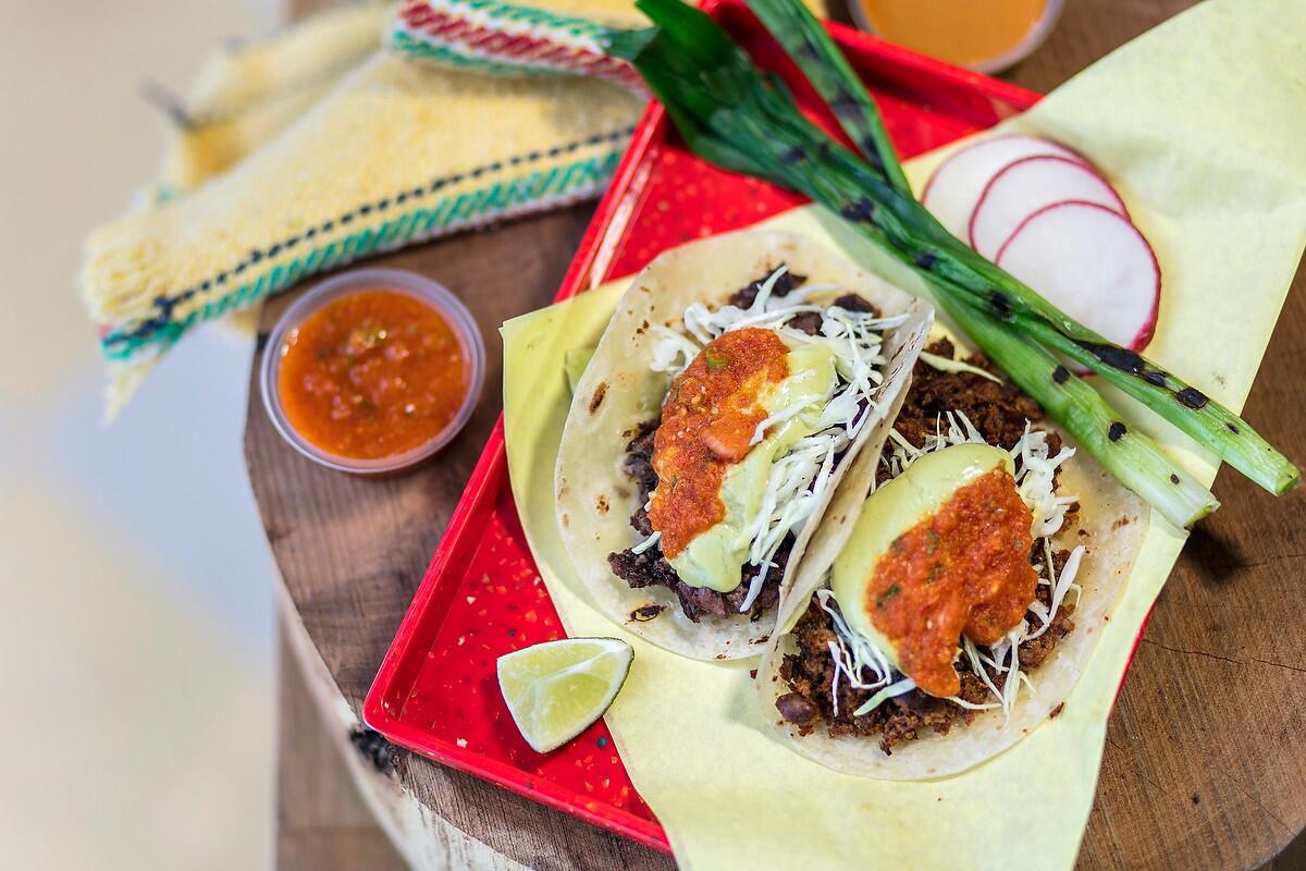 A grilled steak taco and a chorizo taco at Sonoratown