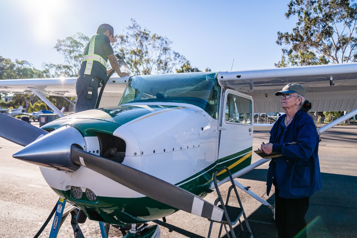 Ann Rothwell, 74 years old, during a pre-flight check while the Cessna 172 receives fuel on November 12, 2021