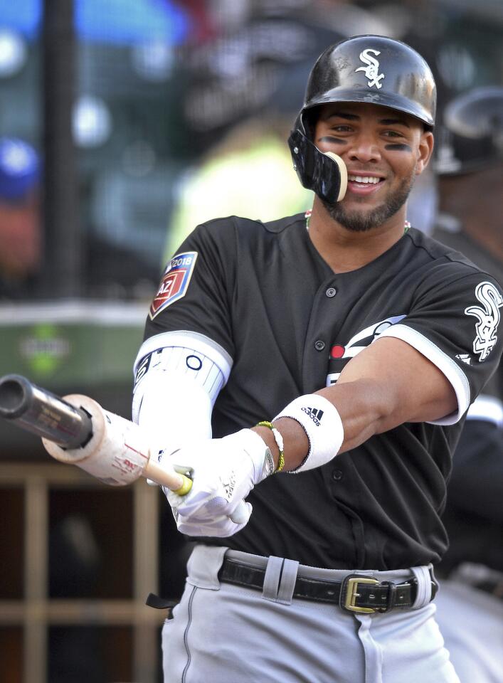 Yoan Moncada smiles as he prepares to step into the batters box during a spring training game against the Charlotte Knights in Charlotte, N.C., Monday, March 26, 2018.