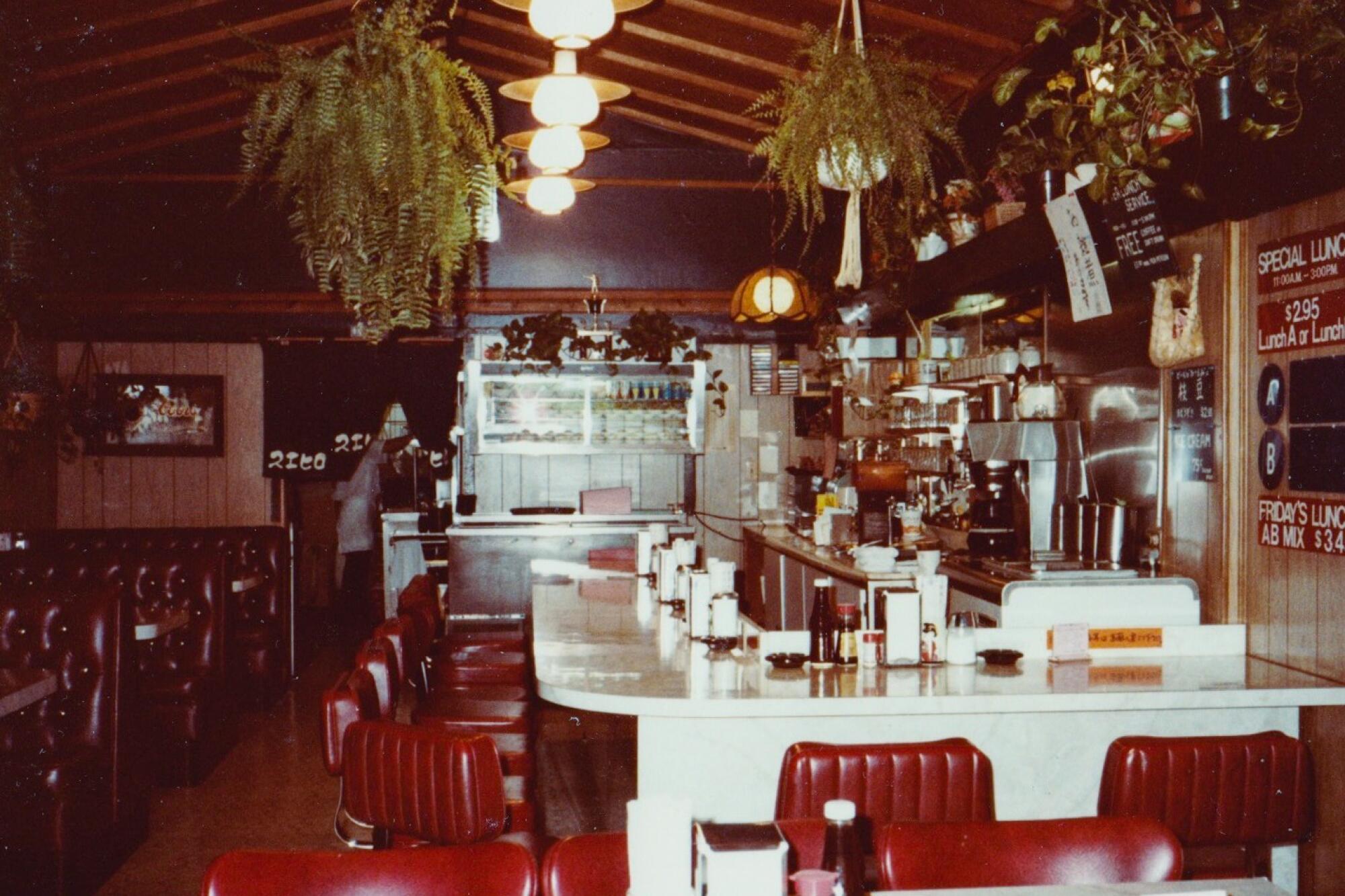 An interior photo of the original Suehiro Cafe on 2nd Street, showing the L-shaped bar.