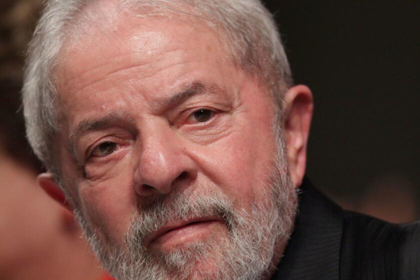 Brazil's Former President Luiz Inacio Lula da Silva attends the inauguration ceremony of the new Workers' Party directory and of the new party president Gleisi Hoffmann, in Brasilia, Brazil, Wednesday, July 5, 2017. (AP Photo/Eraldo Peres)