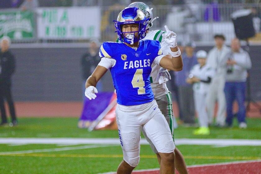 Trent Mosley of Santa Margarita signals No. 1 and there's lots of reasons he's The Times player of the year.
