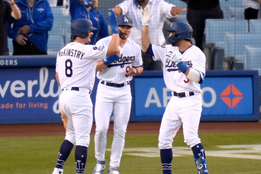 LOS ANGELES, CALIFORNIA - APRIL 10: Chris Taylor #3 of the Los Angeles Dodgers celebrates his three run homerun.