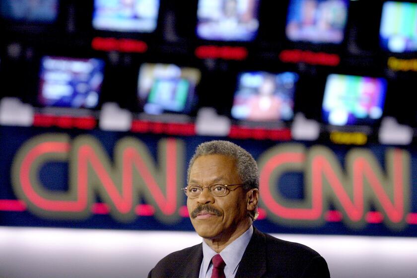 A news anchor appears with a CNN logo behind him