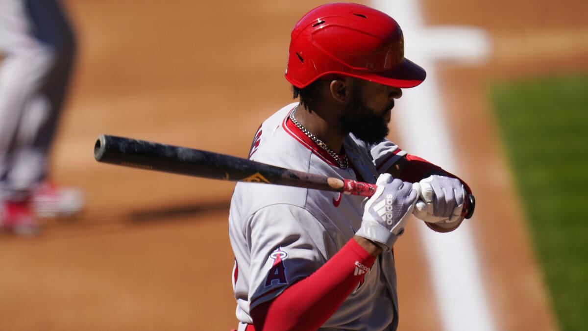 Angels center fielder Jo Adell bats against the Colorado Rockies in September.