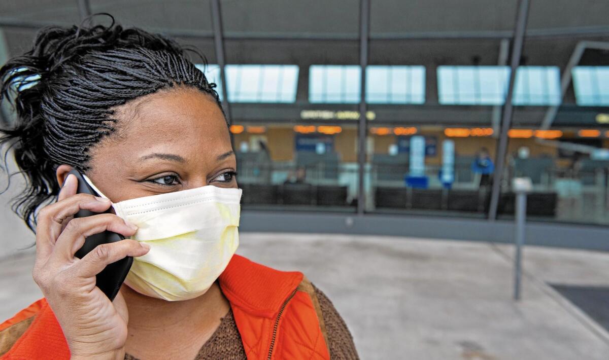 A face mask can lessen germs' spread. Other options: hand sanitizer and anti-bacterial wipes.