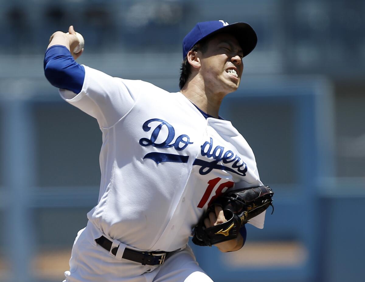 Dodgers starter Kenta Maeda delivers a pitch against the Padres during the first inning.