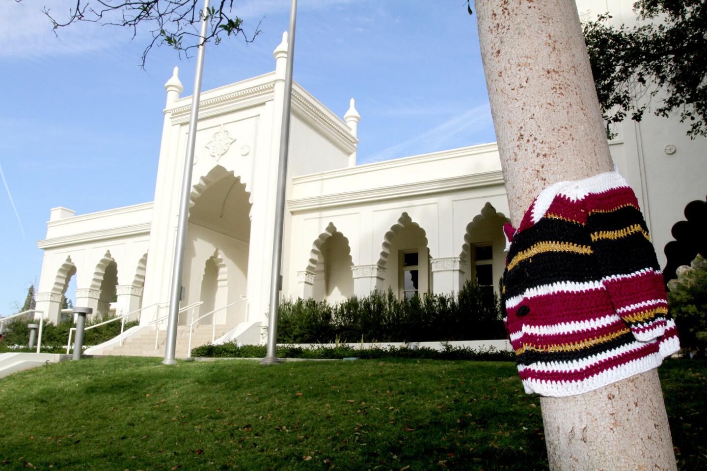 Photo Gallery: Brand Library grounds artistically yarn bombed by knit graffiti movement