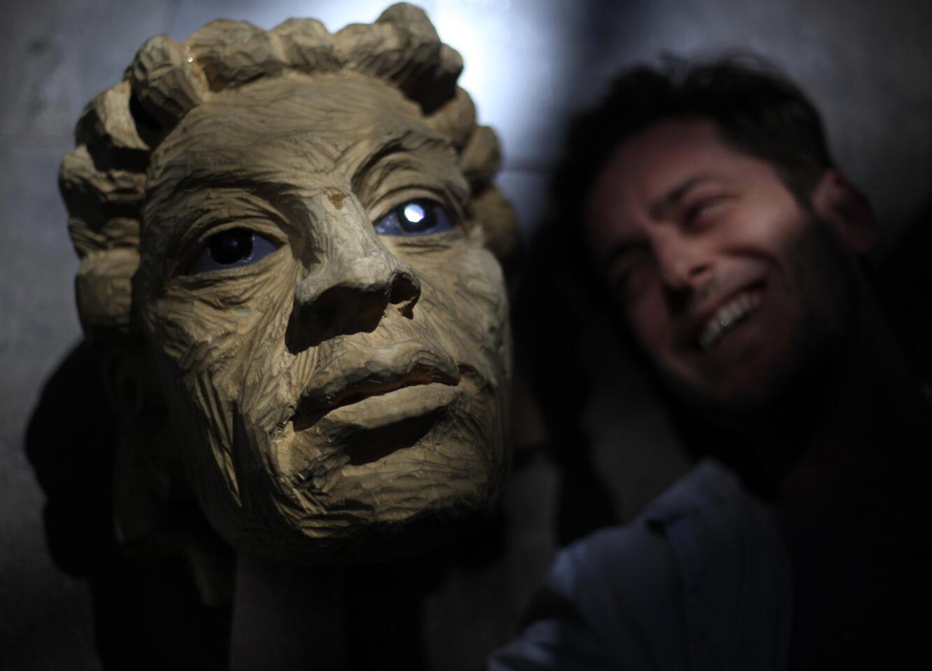 David Ricardo Pearce, who plays Theseus/Oberon, holds the giant puppet head at the Broad Stage in Santa Monica. The Bristol Old Vic theater company and Handspring Puppet Co. are collaborating on an offbeat production of Shakespeare's "A Midsummer Night's Dream."