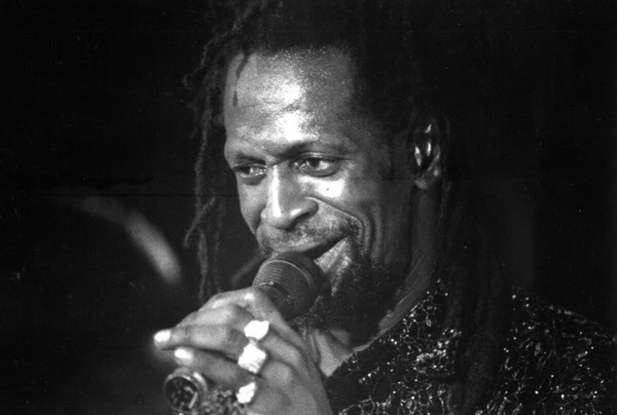 Gregory Isaacs in 1992 during a performance at the Veterans Auditorium in Culver City.