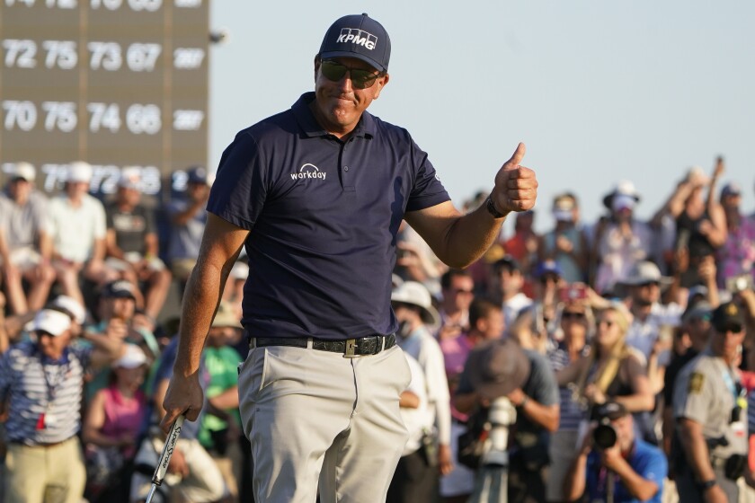 FILE - Phil Mickelson celebrates after winning the final round at the PGA Championship golf tournament on the Ocean Course, Sunday, May 23, 2021, in Kiawah Island, S.C. (AP Photo/Chris Carlson)