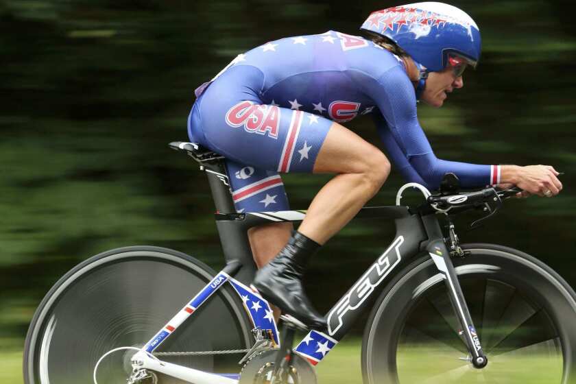 Kristin Armstrong of the United States competes in the women's cycling individual time trial. Armstrong successfully defended her Olympic gold in the grueling event.