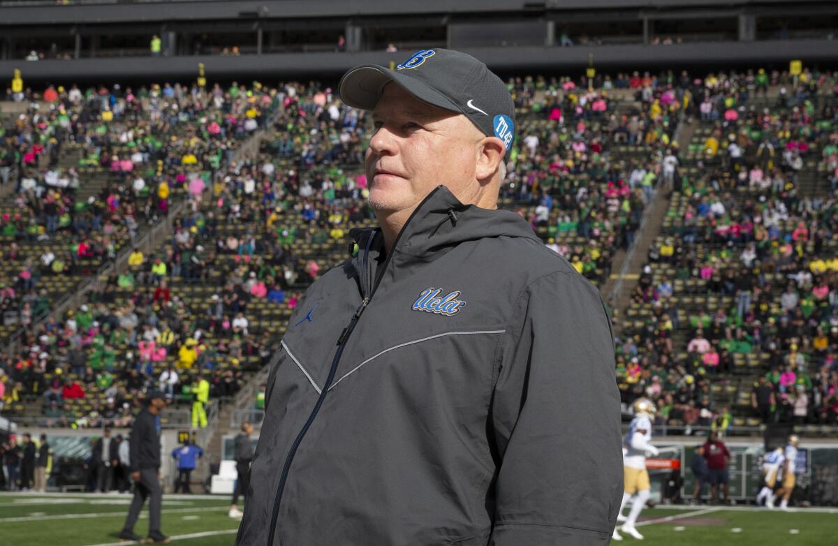 UCLA head coach Chip Kelly walks the sidelines at Autzen Stadium.