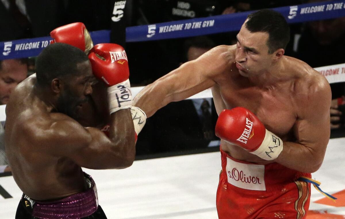 Wladimir Klitschko, right, throws a punch to the face of Bryant Jennings on Saturday night at Madison Square Garden.