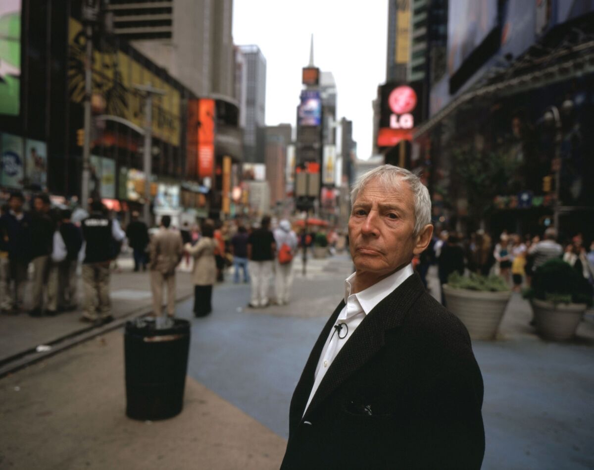 Robert Durst stands in Times Square.