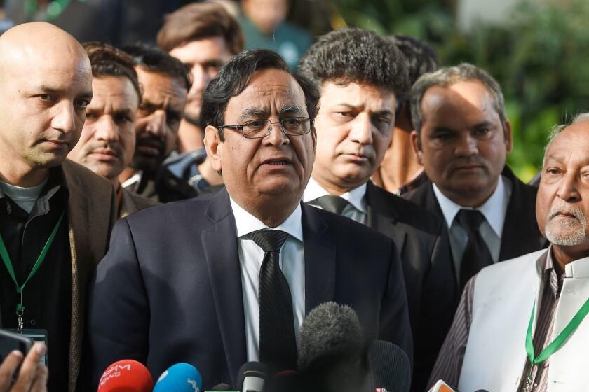 Saif-ul-Mulook (C), the lawyer of Pakistani Christian Asia Bibi, speaks to the media outside the Supreme Court building after the court rejected the review appeal against Asia Bibi, in Islamabad on January 29, 2019. - Pakistan's Supreme Court rejected on January 29 a challenge against its decision to acquit Asia Bibi, lifting the last legal hurdle in the years-long blasphemy case and potentially paving the way for the Christian mother to leave the country. (Photo by FAROOQ NAEEM / AFP)FAROOQ NAEEM/AFP/Getty Images ** OUTS - ELSENT, FPG, CM - OUTS * NM, PH, VA if sourced by CT, LA or MoD **