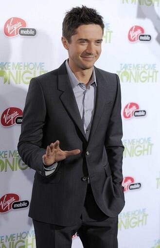 "That '70s Show" alum Topher Grace gets to relive the past with his new '80s-themed movie, "Take Me Home Tonight." Grace, here at the Los Angeles premiere, stars as Matt Franklin, a recent college graduate working at Suncoast video and trying to figure out what to do with his life.