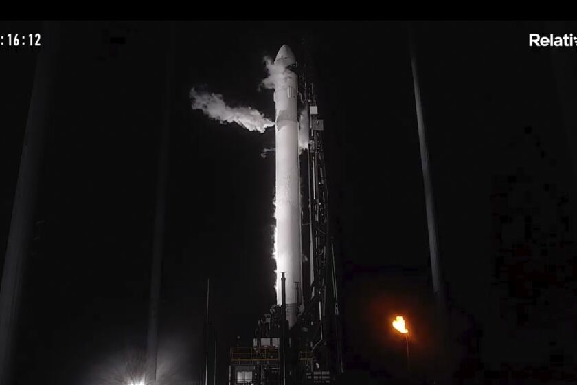 In this frame grab from livestreamed video provided by Relativity Space, Terran 1 sits on a launch pad at Cape Canaveral, Fla., late Wednesday, March 22, 2023. The rocket is made almost entirely of 3D-printed parts. (Relativity Space via AP)