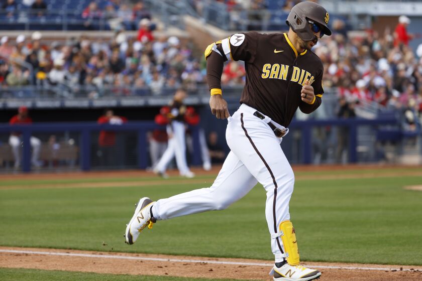 Peoria AZ - February 26: San Diego Padres' Trent Grisham his a home run in the second inning of a spring training game against the Arizona Diamondbacks on Sunday, February 26, 2023 in Peoria, AZ. (K.C. Alfred / The San Diego Union-Tribune)