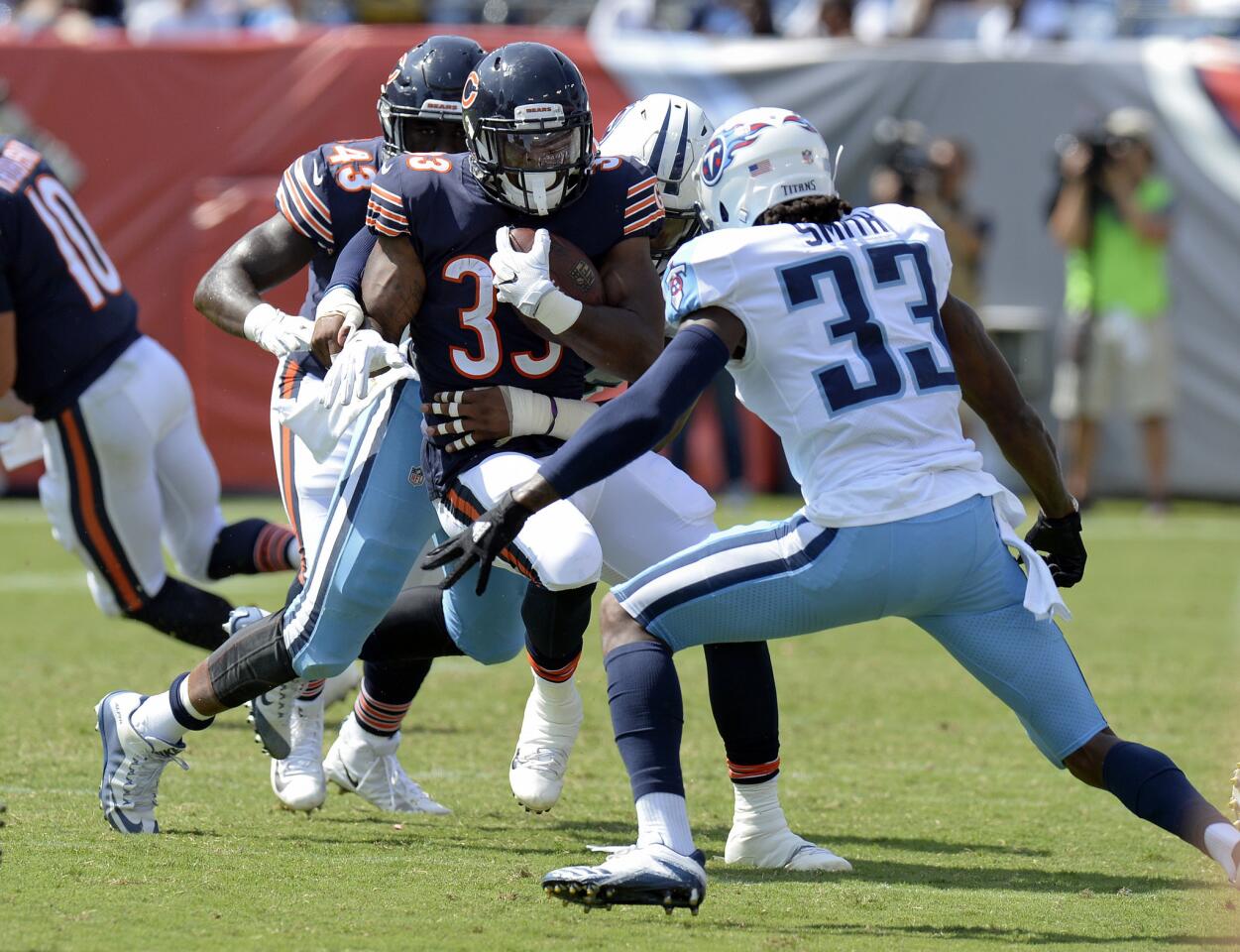 Bears running back Jeremy Langford faces Titans cornerback Tye Smith in the second half of an exhibition on Sunday, Aug. 27, 2017, in Nashville, Tenn.
