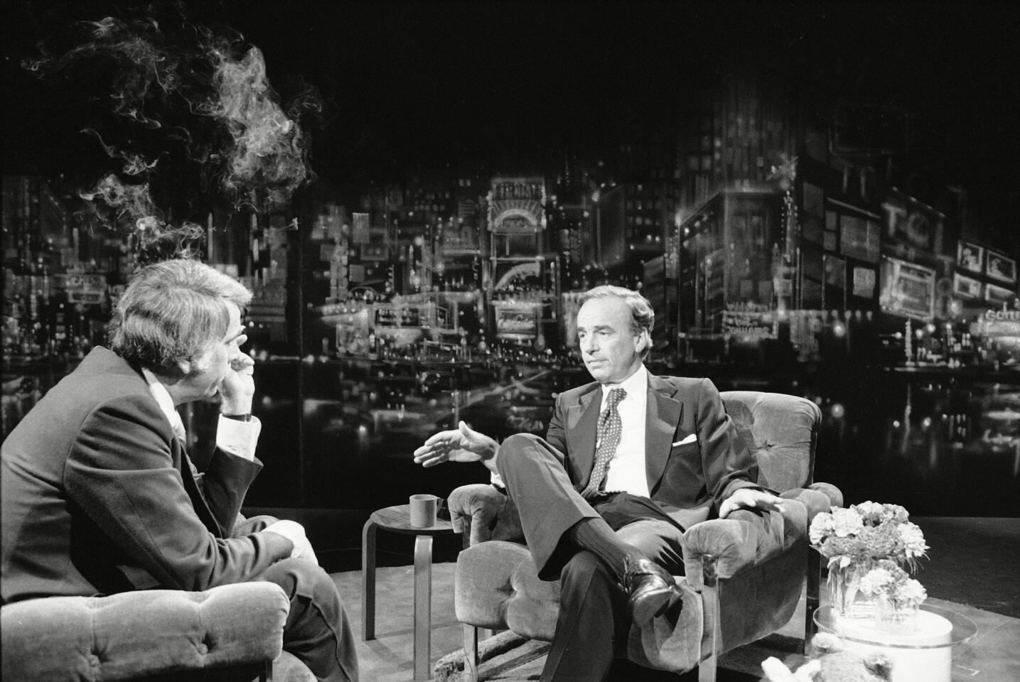 Rupert Murdoch, right, speaks with Tom Snyder on NBC's "Tomorrow" show on Sept. 12, 1978 in New York City.