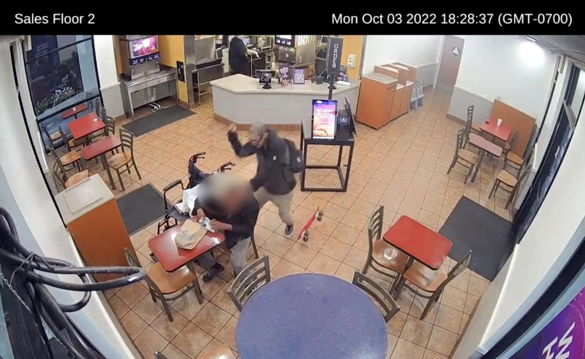 Surveillance footage provided by LAPD shows suspect stabbing a wheelchair bound 82-year-old man inside a Taco Bell on Oct. 3