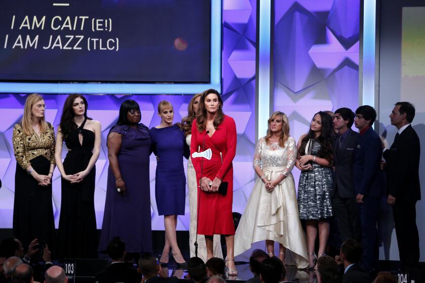 The casts of "I Am Cait" and "I Am Jazz" accept the award for outstanding reality program onstage during the 27th GLAAD Media Awards.