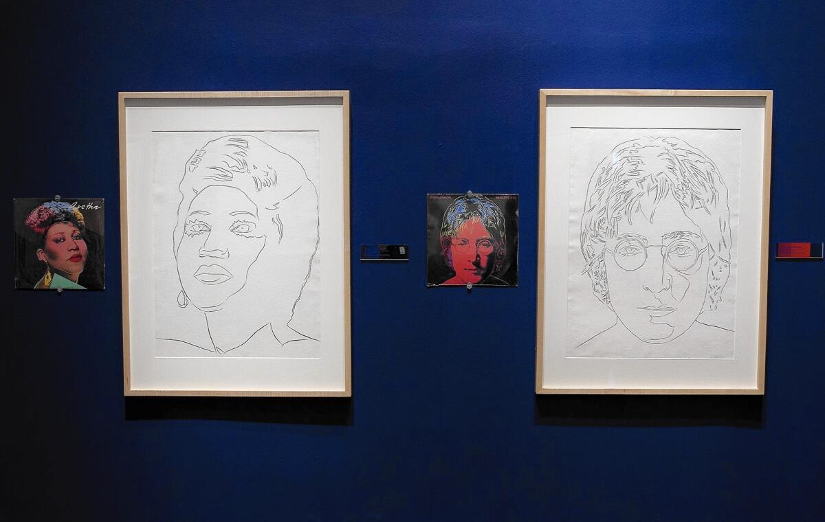 Drawings of Aretha Franklin, left, and John Lennon at an exhibit called "The Late Drawings of Andy Warhol 1973-1987" at the Fullerton Museum Center.