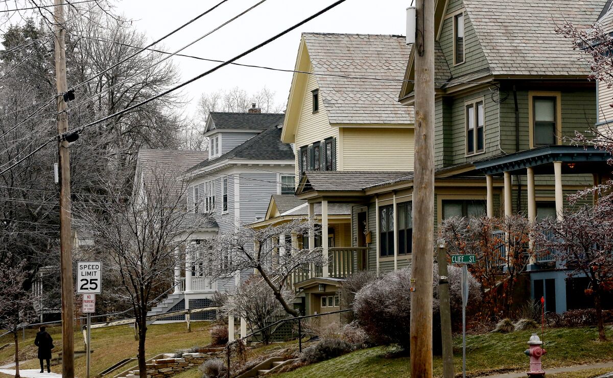 Homes line a street in Burlington, Vt.