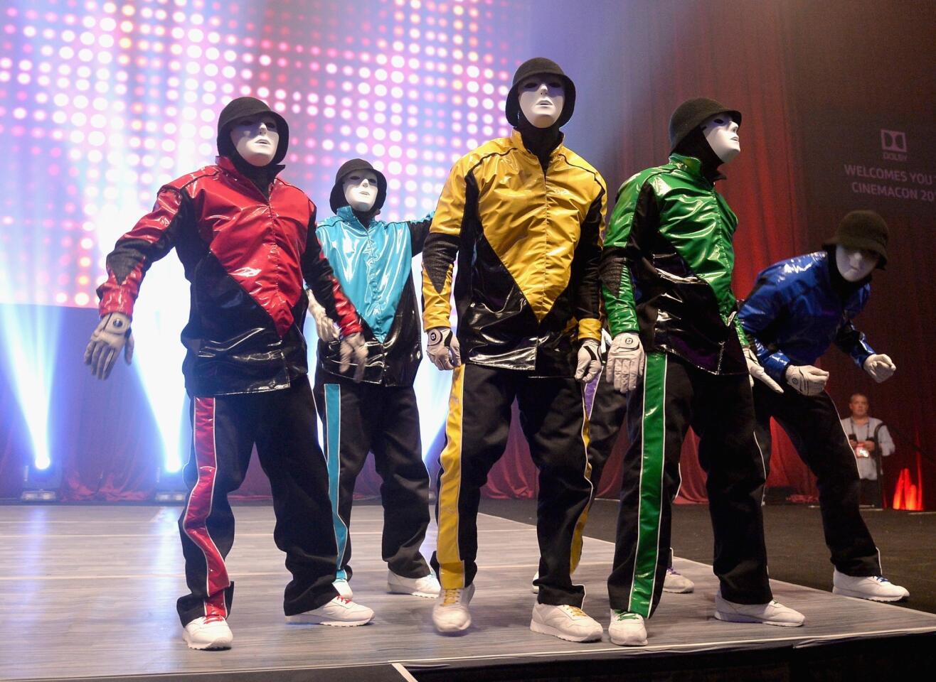 Hip-hop dance crew Jabbawockeez performs at CinemaCon.