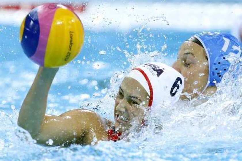Maggie Steffens, left, of the United States, resists a challenge from Teresa Frassinetti of Italy during their women's water polo quarterfinal match Sunday.