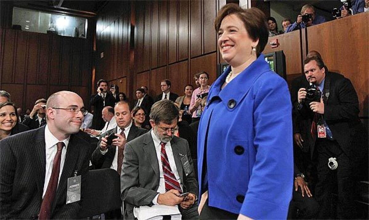 Supreme Court Justice Elena Kagan in a blue jacket