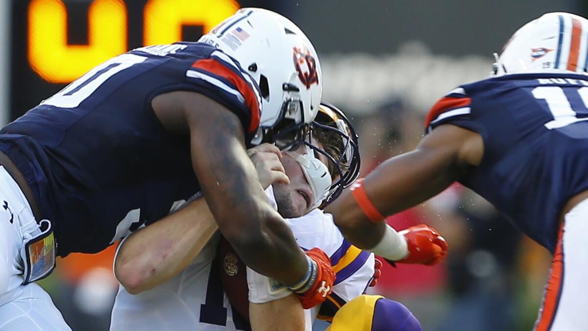 Although Auburn linebacker Tre' Williams was penalized for targeting LSU quarterback Danny Etling on this play, replay officials now can stop the game if a call like this is missed on the field.
