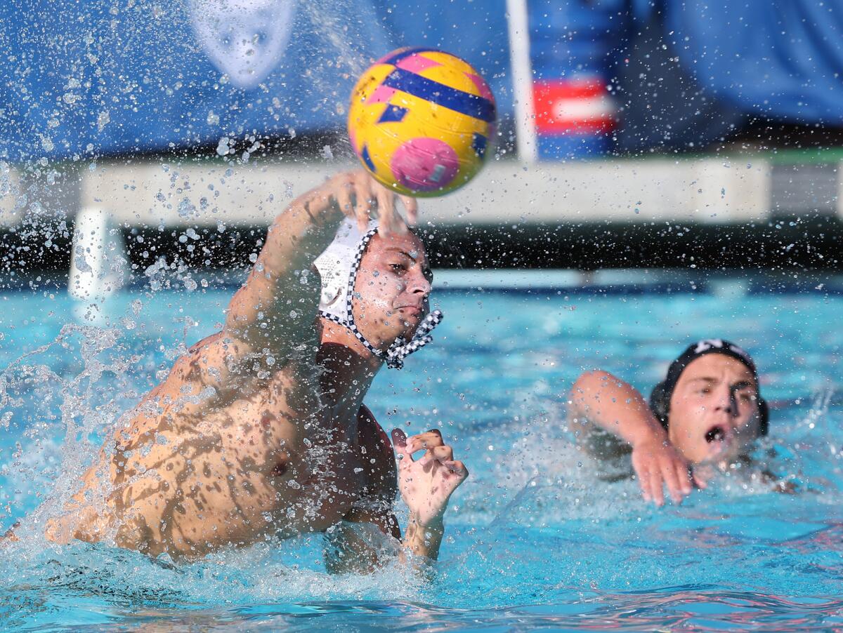 Kai Kaneko (18) of Newport Beach Water Polo Club shoots in a goal against North Irvine during Tuesday's match.