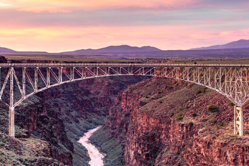 A colorful sky forms the backdrop to the bridge spanning the Rio Grande Gorge near Taos, New Mexico. ** OUTS - ELSENT, FPG, CM - OUTS * NM, PH, VA if sourced by CT, LA or MoD **