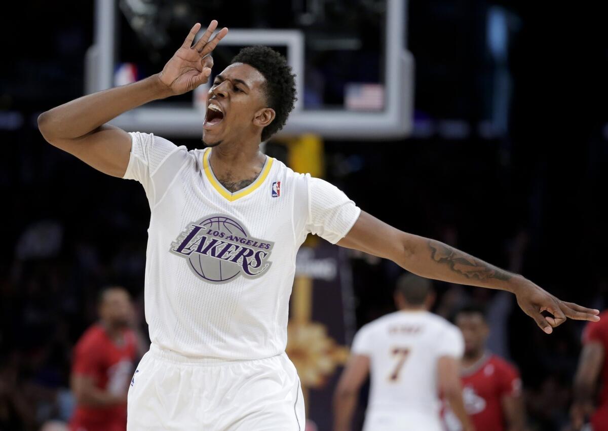 Lakers guard Nick Young gestures during the team's Christmas Day loss to the Miami Heat.